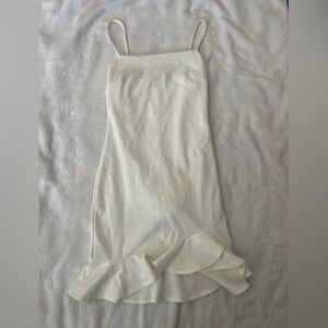 Elegant Cream Slip Dress with Ruffle Hem NWT